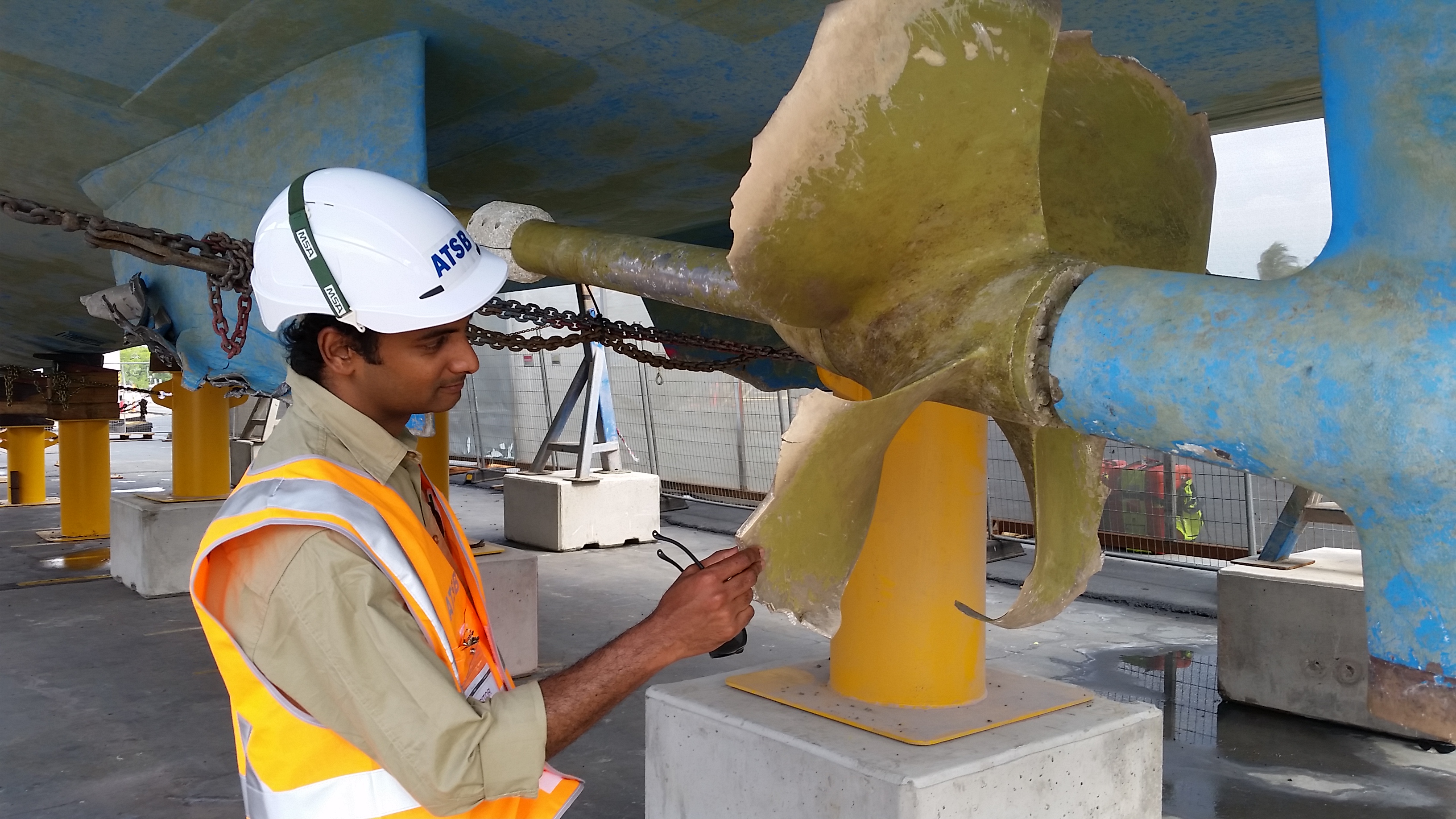 Investigator inspecting a damaged vessel.