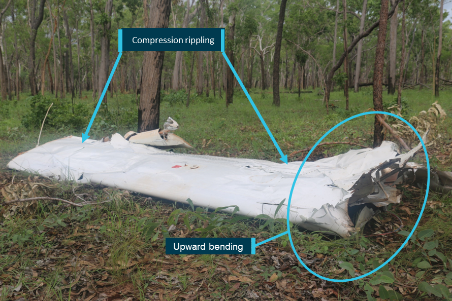 Figure 5: Separated right wing assembly showing damage associated with significant upward bending forces