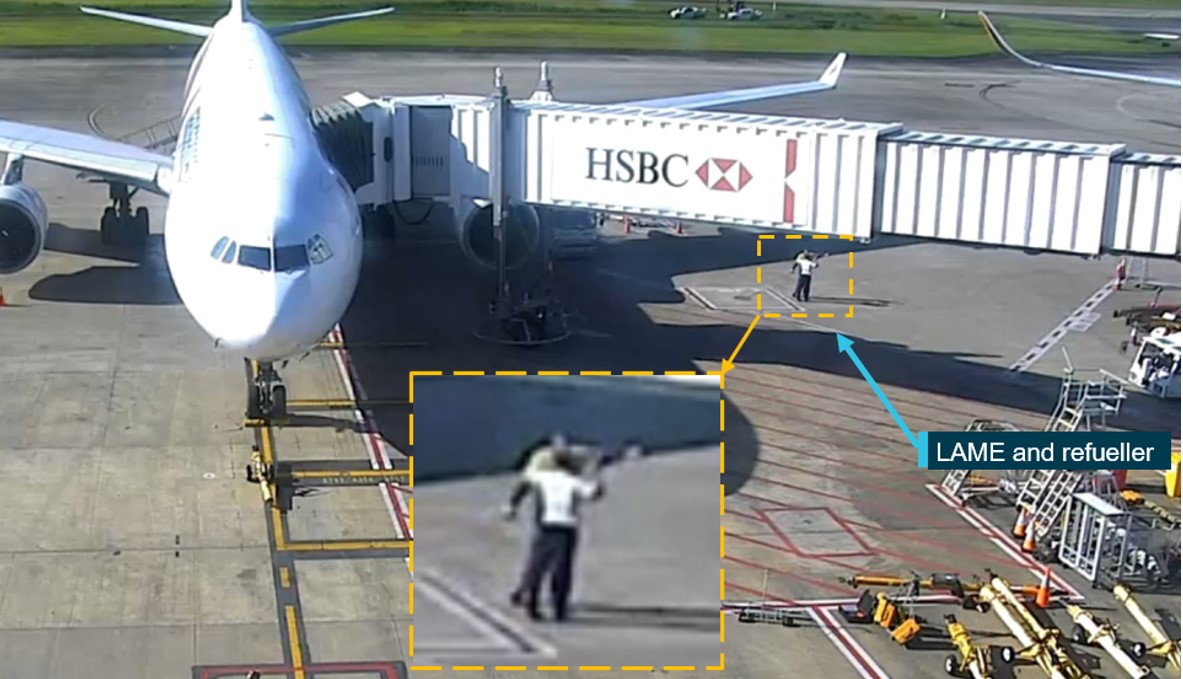 Figure&nbsp;2: Security footage of the refueller pointing towards SQ256 and informing the LAME that the pitot covers were fitted