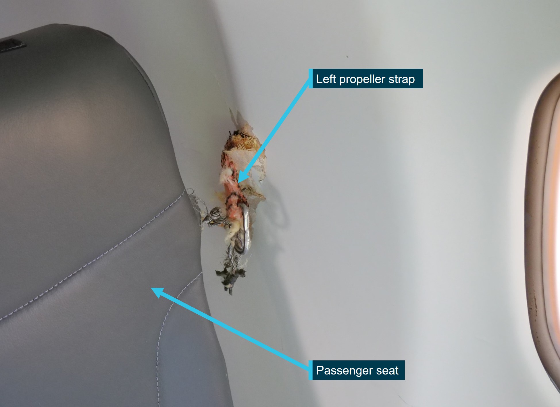 Figure&nbsp;1: Part of the left propeller strap that entered the fuselage adjacent to seat 2A