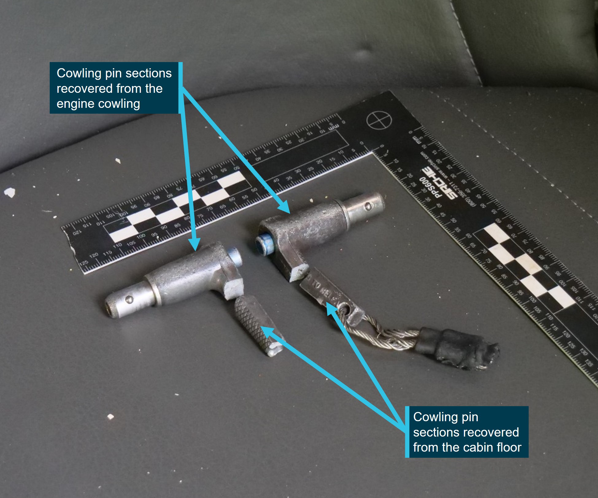 Figure&nbsp;3: Parts of the cowling pins recovered from the cabin floor and the engine cowling