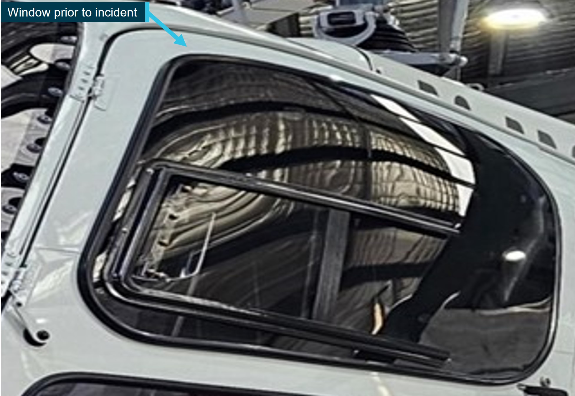 Figure&nbsp;1: Airbus AS350 B2 left front door upper window before the incident