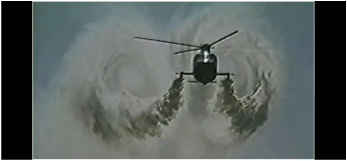 Visualisation of the wake vortices behind an S-76A helicopter in forward flight with smoke generators from the FAA (1996) flight tests.