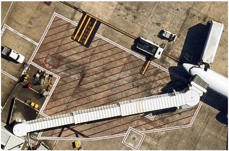 This image shows the aerobridge docked to a Boeing 737 aircraft. The aerobridge is situated in an east-north-east position, about 30 metres laterally from the home position.