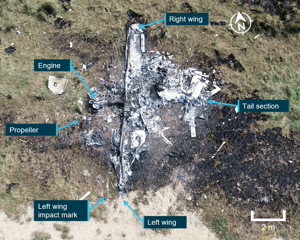 Overview photograph of the aircraft wreckage.