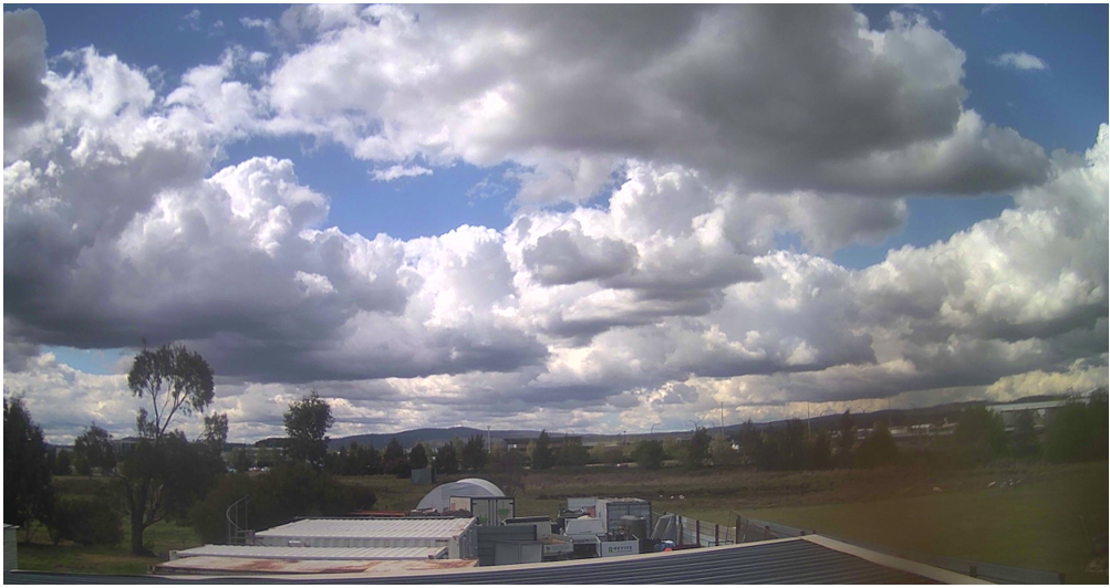Image from a weather camera near Canberra Airport showing an image of the sky and cloud in the general direction of the aircraft flight at the time of take-off.