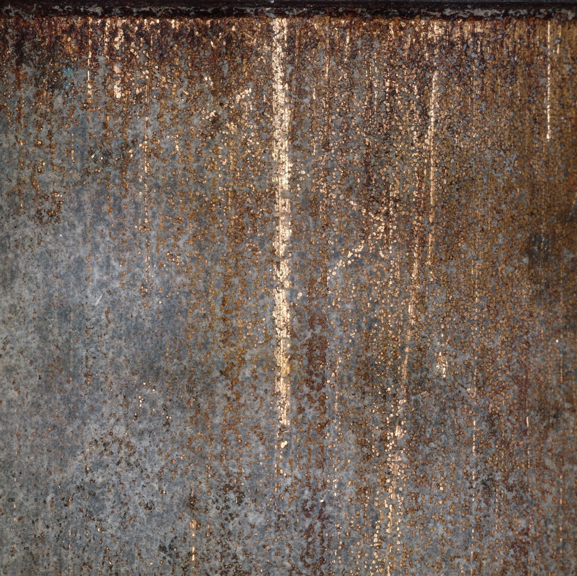 Close-up of right carriage assembly showing worn PTFE layer exposing bronze layer