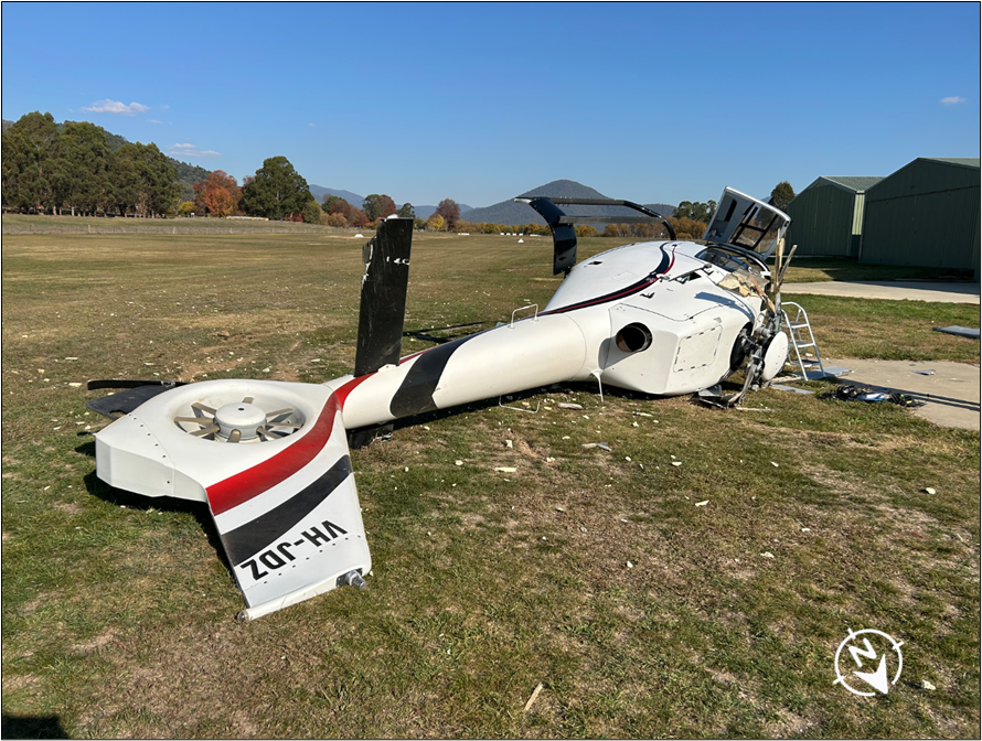 Photograph of the damaged helicopter wreckage after dynamic rollover.