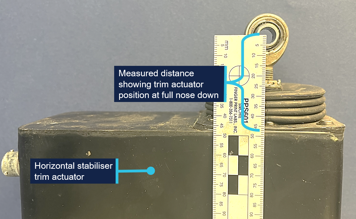 Image showing the horizontal stabiliser trim actuator and trim rod at full nose down position.