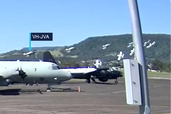 A composite still image from the recorded video of the later part of the accident flight. The image shows the left arcing flight path of VH-JVA.
