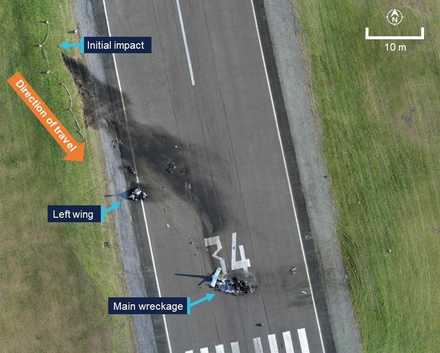 An overview image of the accident site showing the initial impact mark, wreckage and burn trail and the main wreckage.