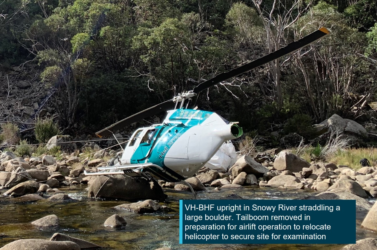 VH-BHF following the collision with terrain against a large boulder in the Snowy River, NSW