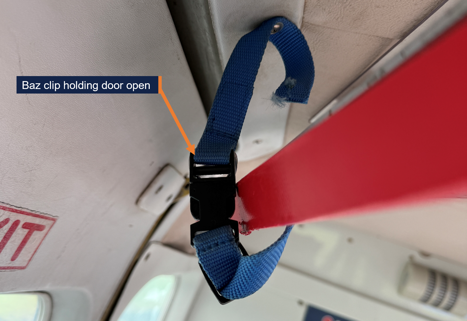 Baz clip holding the roller door open