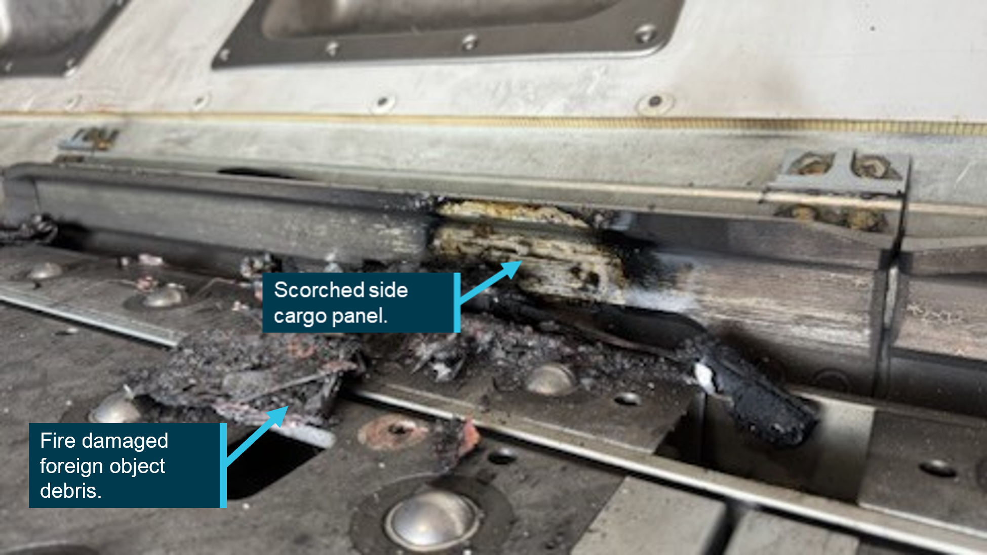Photo showing damage to the cargo compartment floor 