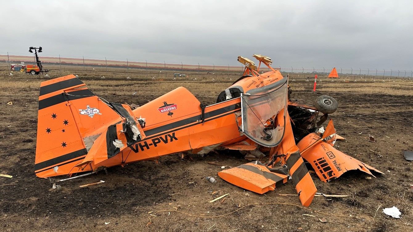 VH-PVX at the accident site, the image shows the extent of the damage resulting from the collision with terrain.