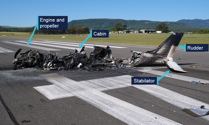 The burnt out fuselage wreckage.