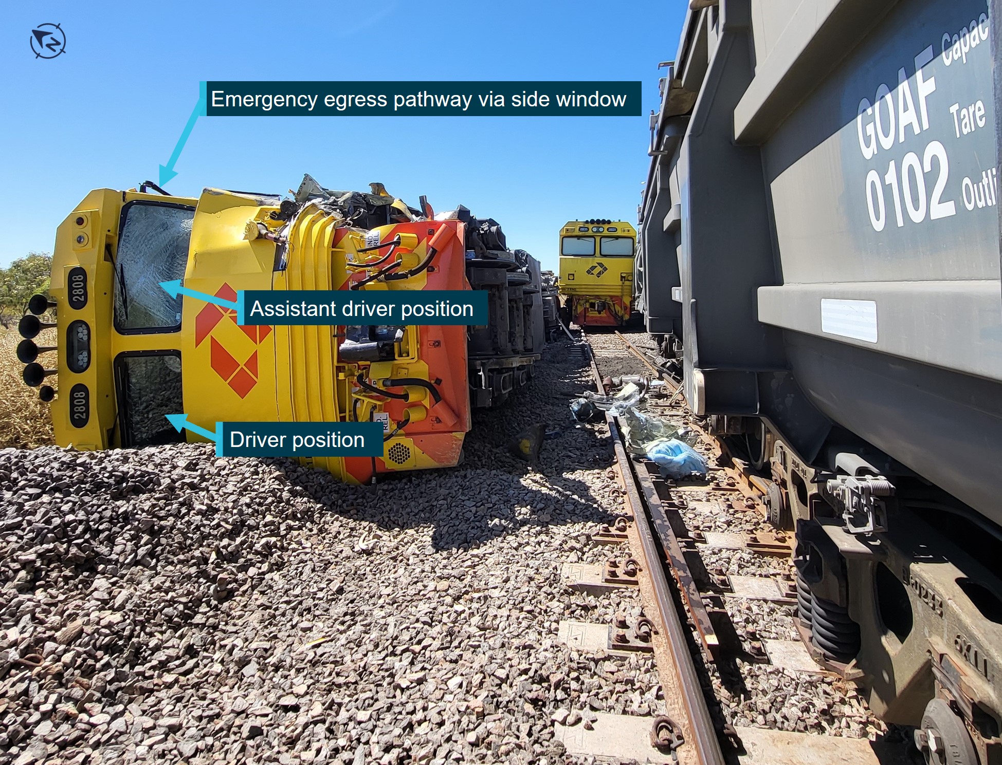 Photograph showing front view of the derailed and overturned lead locomotive of train 9M48.