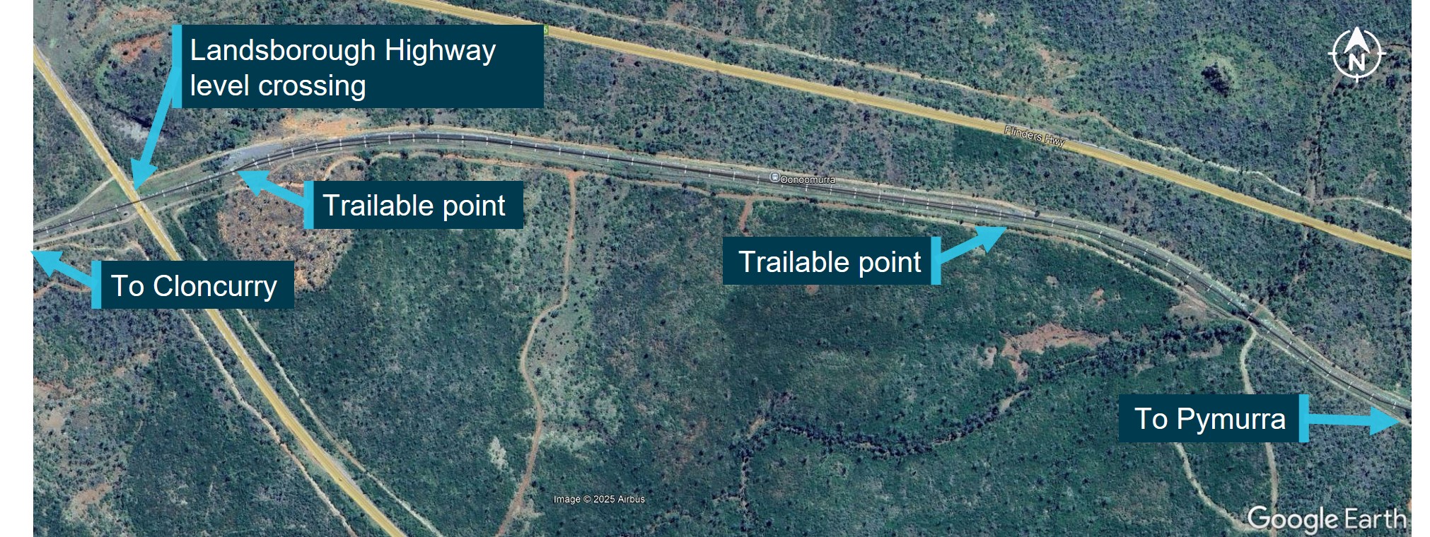 A labelled Google Earth satellite image showing the track alignment and location of the trailable points and Landsborough Highway level crossing.