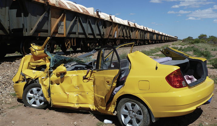 Damaged vehicle from collision with train