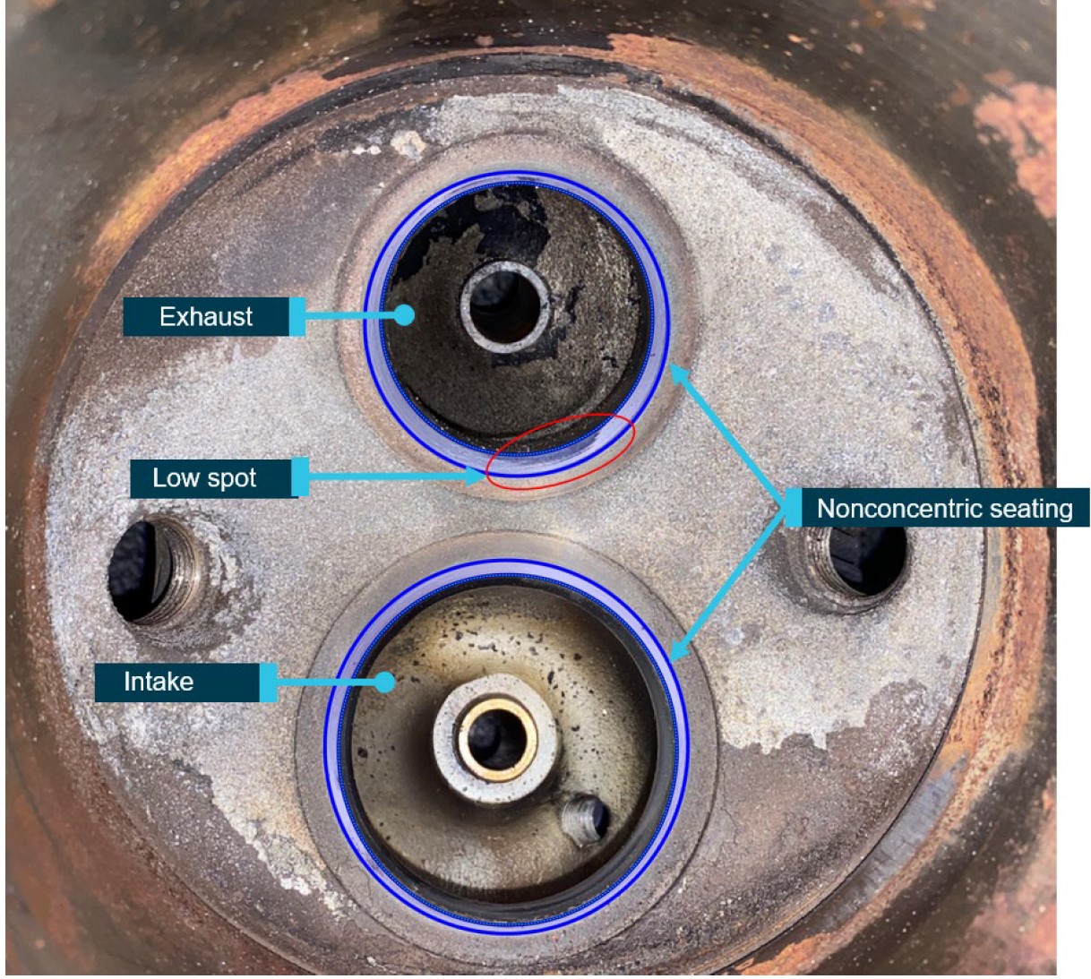 Figure 18: No. 6 cylinder intake and exhaust seats showing nonconcentric valve seating and low spot