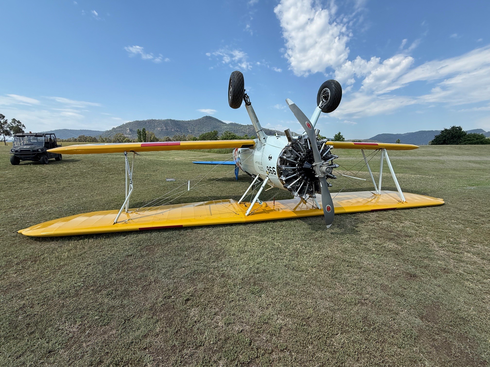 Picture of aircraft after occurrence positioned on its back. 