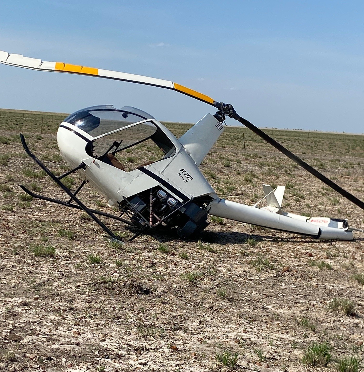 A helicopter crashed in a field</p>
<p>AI-generated content may be incorrect.