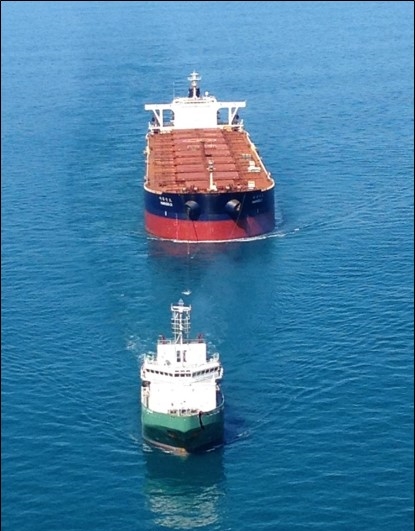 Marigold departing Port Hedland under tow