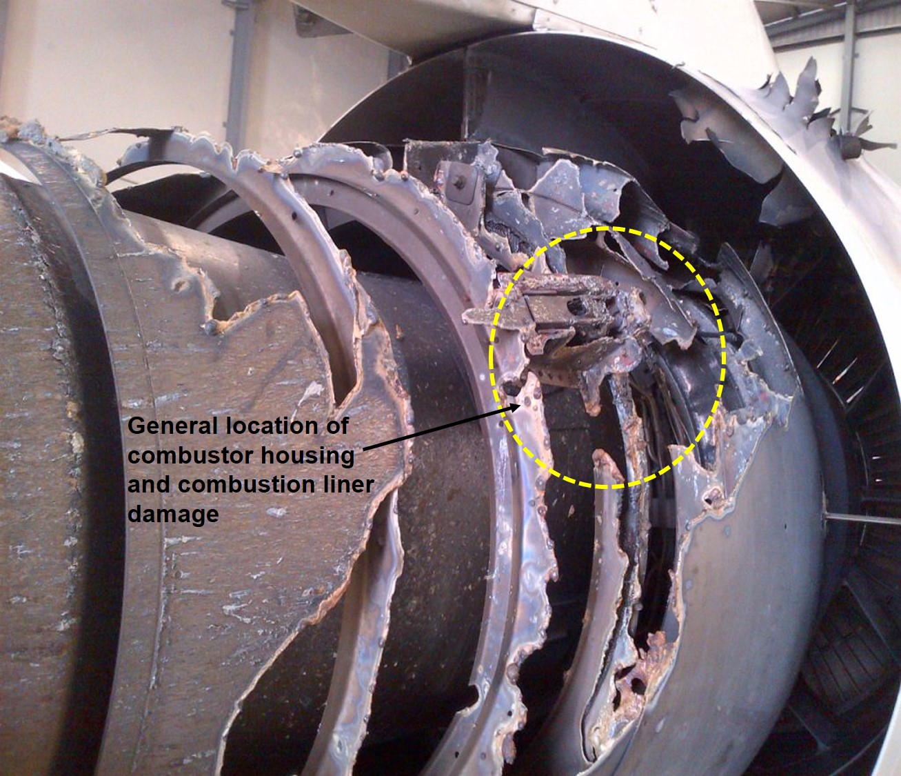 Figure 1: Right side of the No.2 engine showing the fire damage to the combustor housing and liner (looking forward)