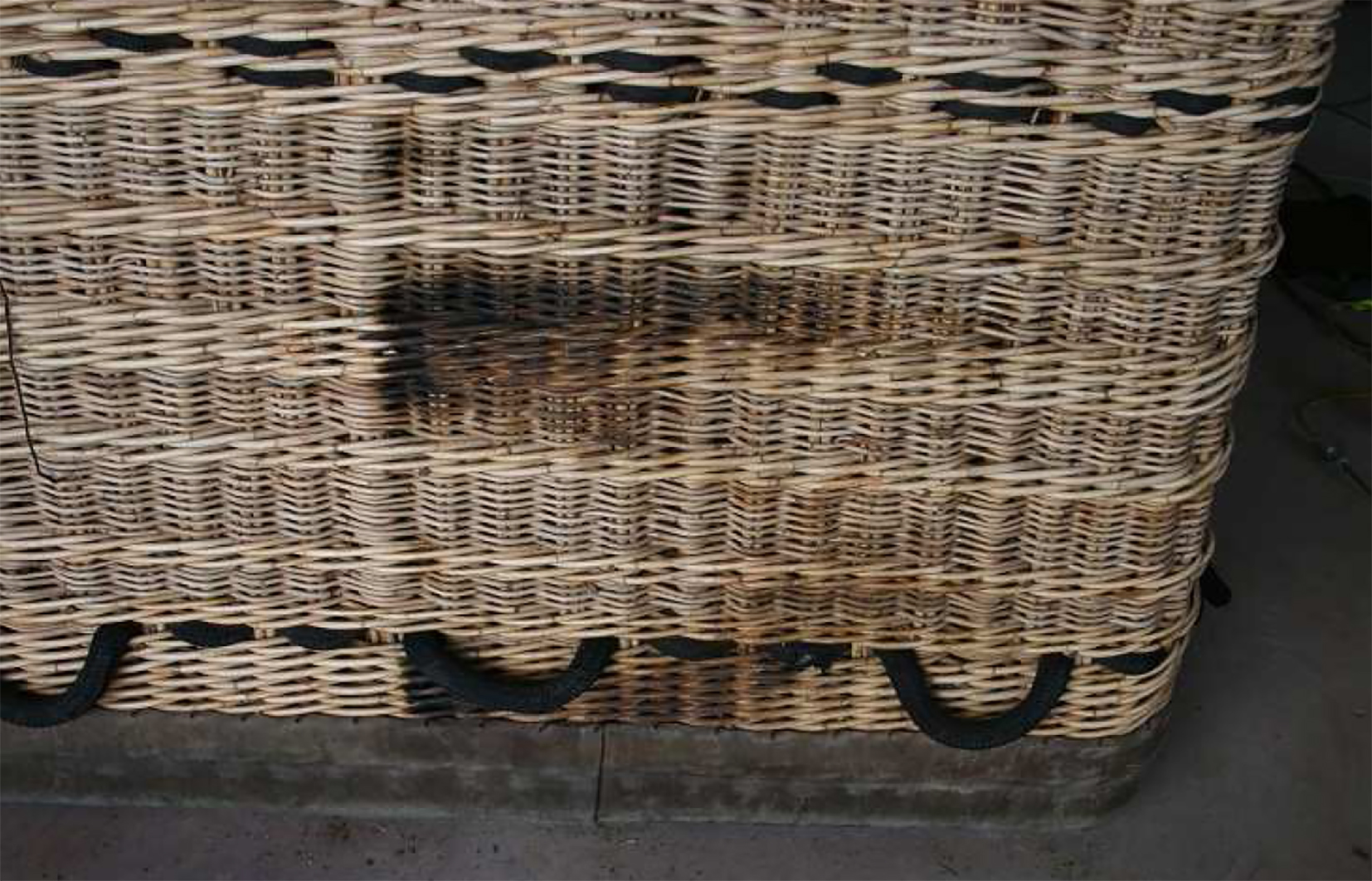 Figure 1: Scorch marks on wicker basket