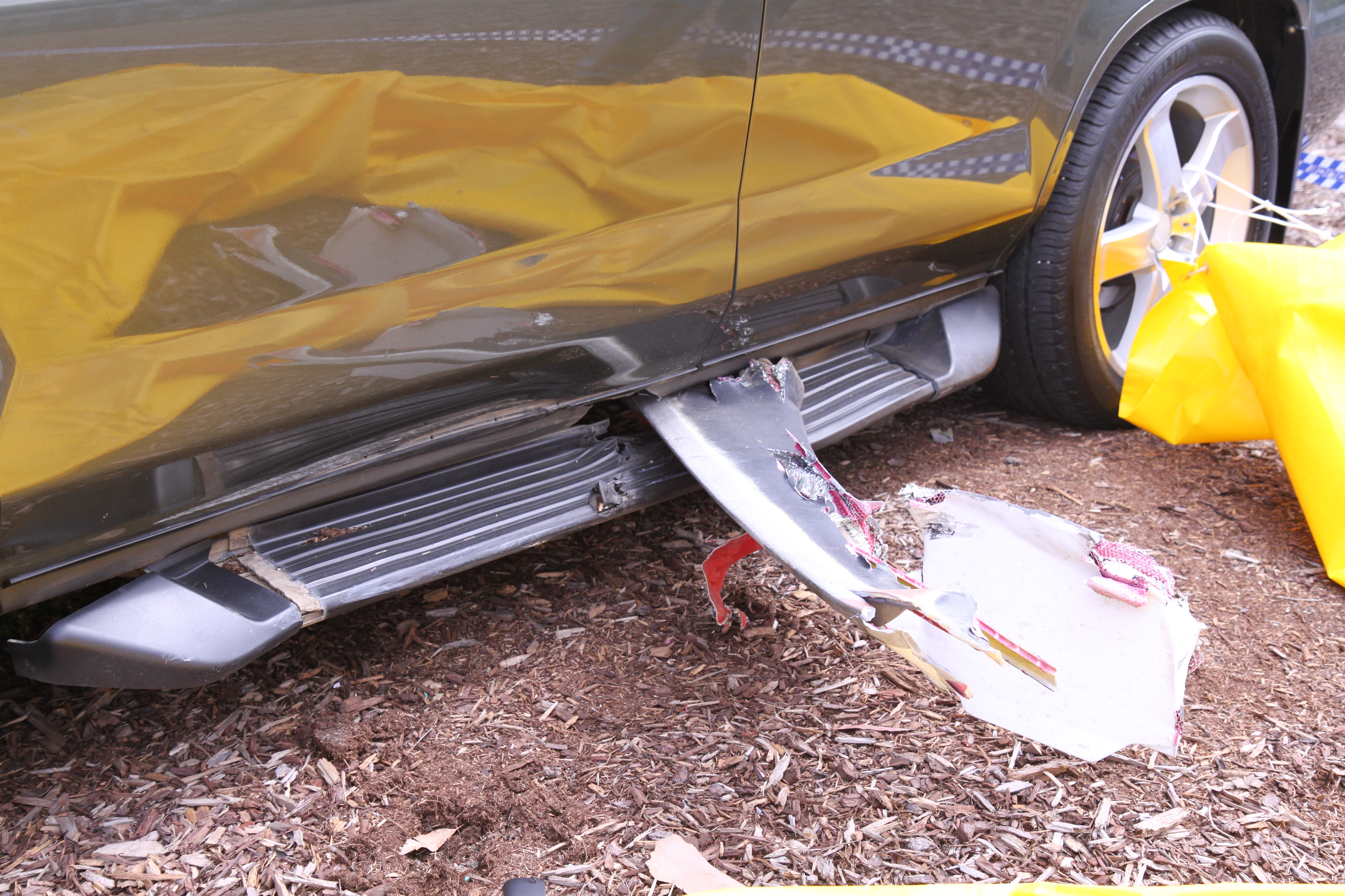 Figure 7: Main rotor debris imbedded inthe nearby car