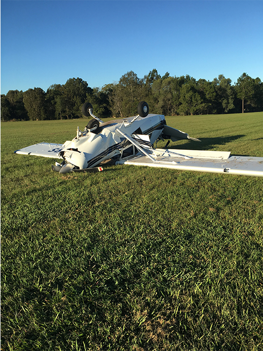 Figure 1: Accident site showing damage to VH-DRS