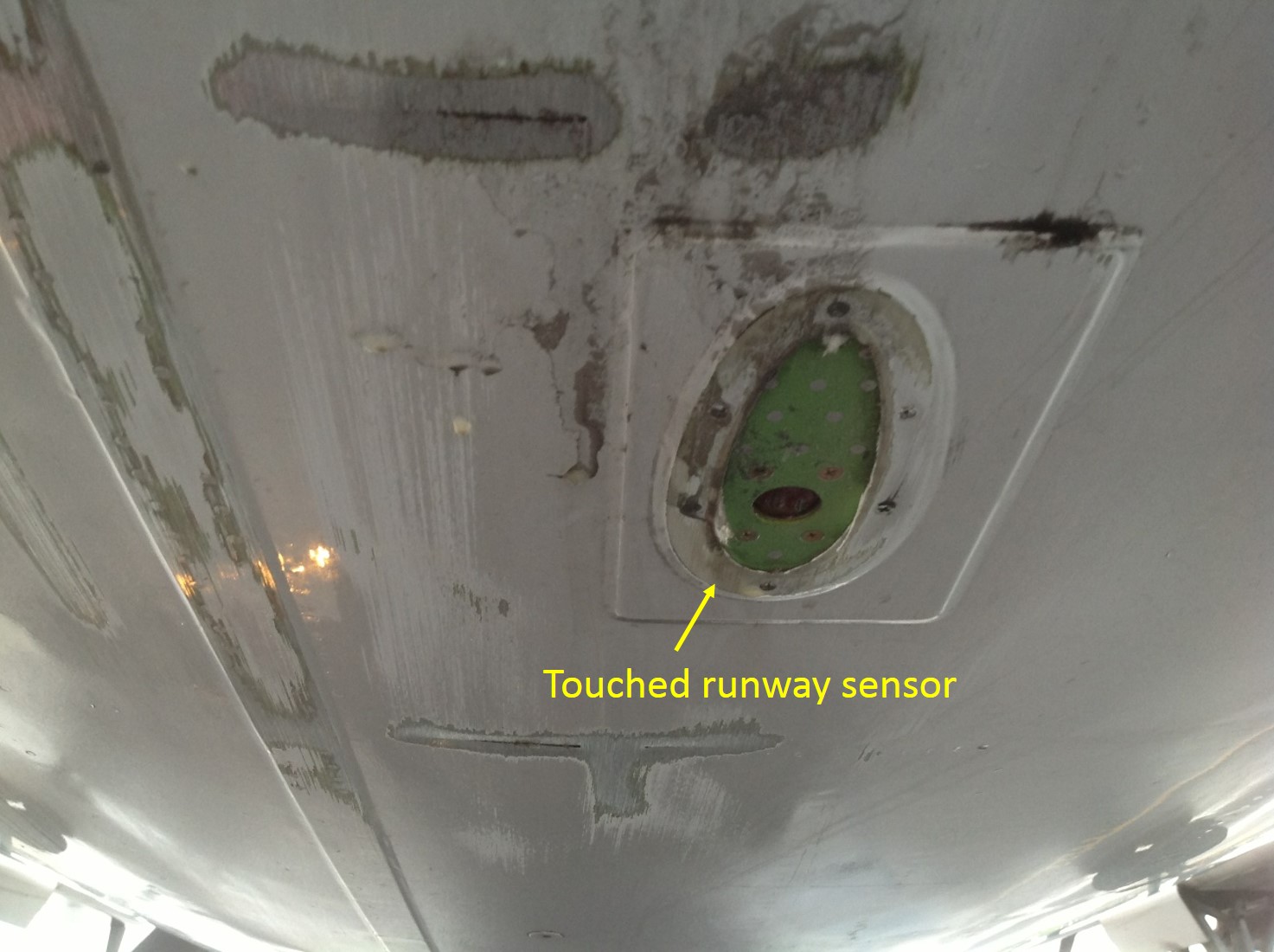 Figure 4: Damage to tail section of VH-QOS (looking aft)