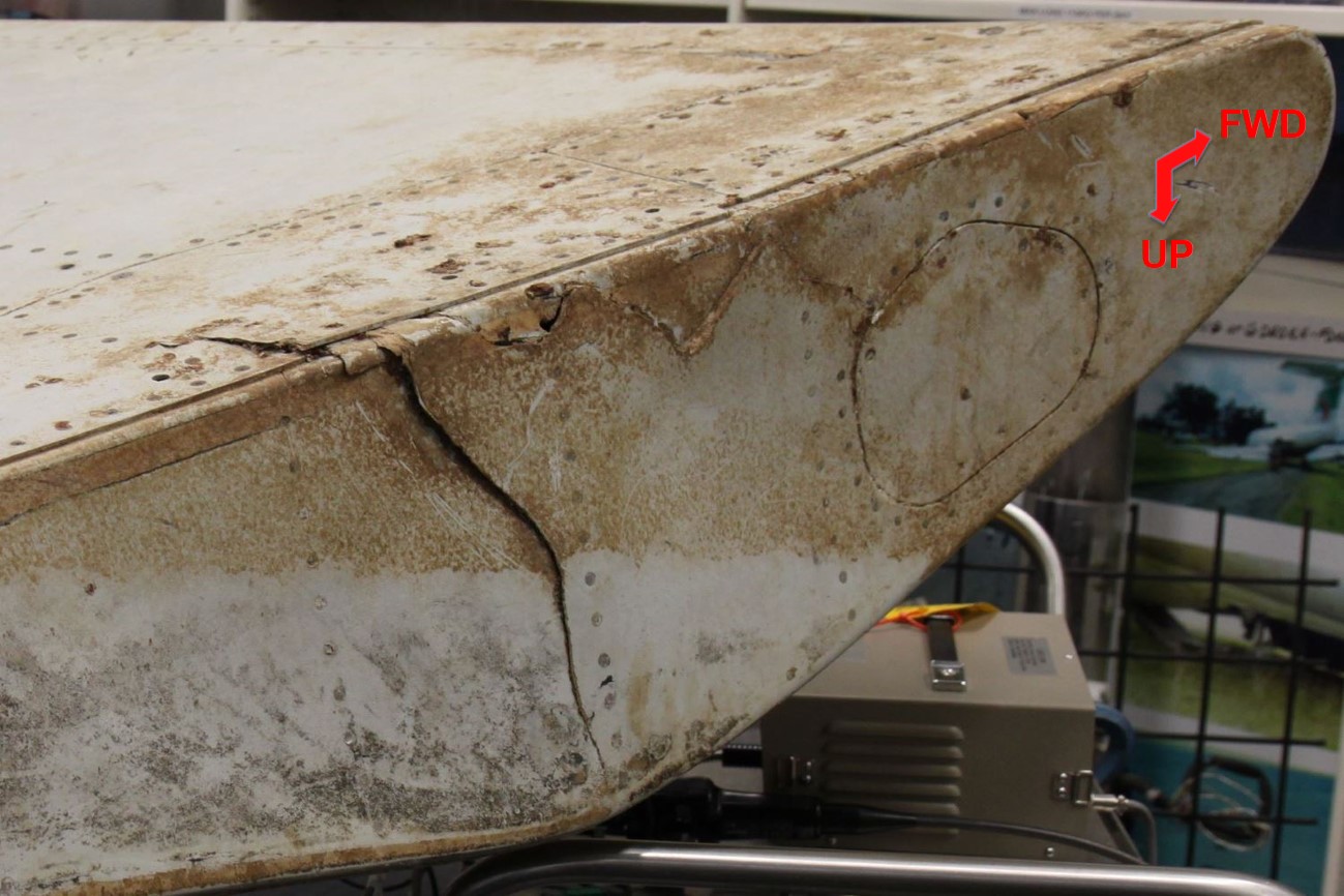 Figure 19: Outboard flap, fractured seal pan (forward)