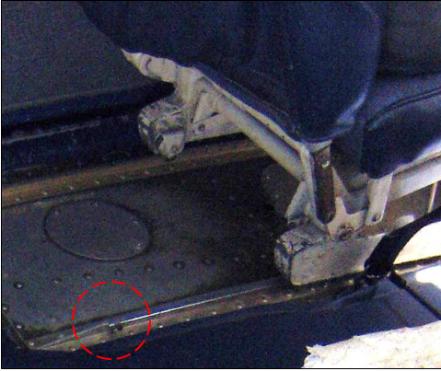Figure 6: Seat rail stop fitted                            Figure 7: Seat rail stop not fitted