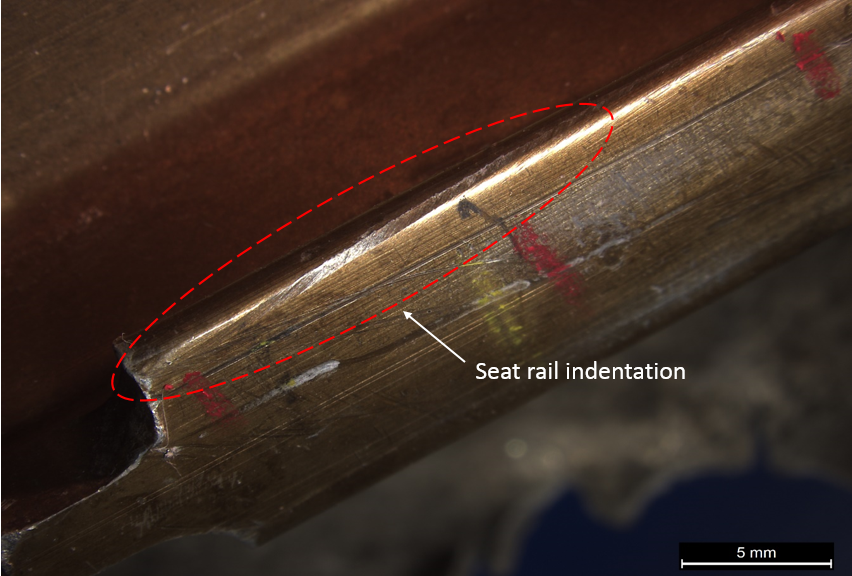 Figure 22: Rear of outboard seat rail showing indentation damage