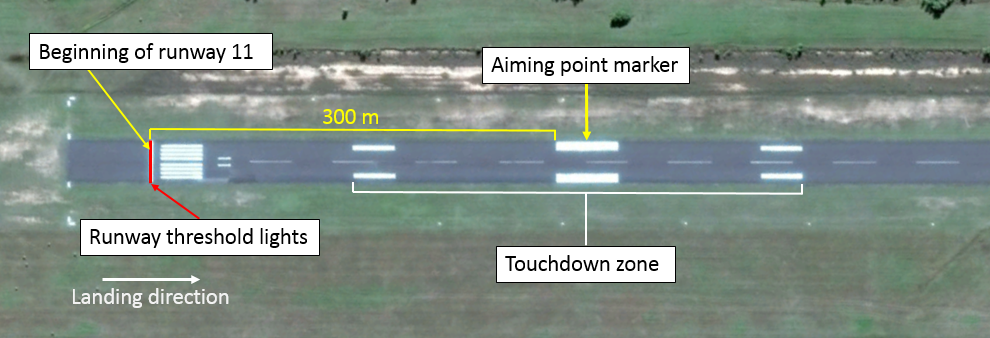 Figure 1: Overview of runway 11 threshold. Image shows the positions of the beginning of the runway, runway threshold lights, aiming point markers and touchdown zone. Source: Google earth, annotate by ATSB
