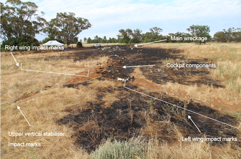 Figure 3: Accident site, showing ground impact marks and the main wreckage in the background