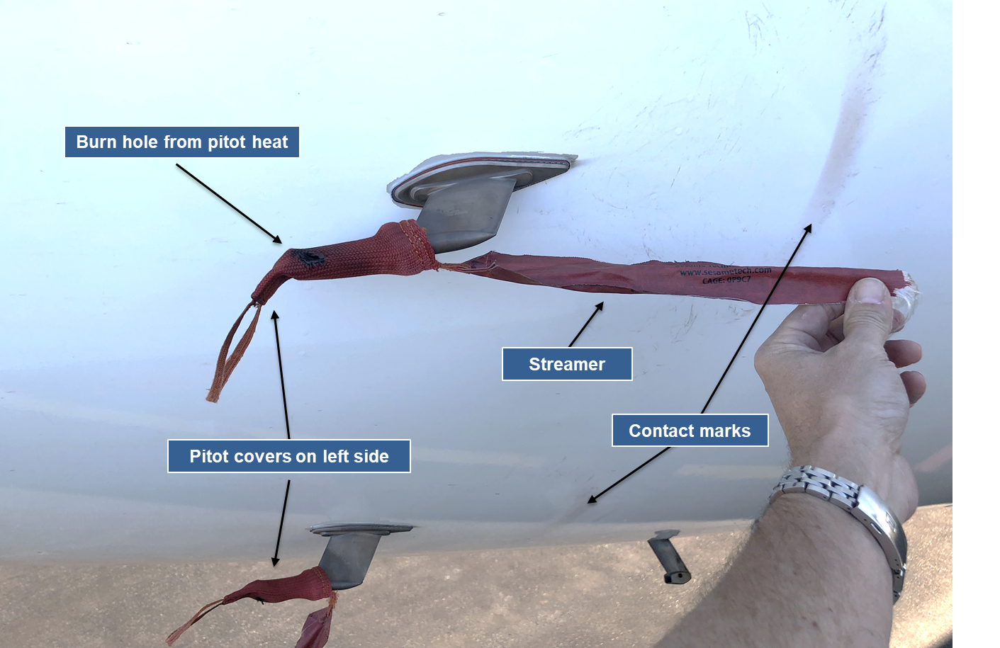 Figure 5: Reconstruction of pitot probe covers on 9M-MTK, showing pitot cover damage and rub marks on aircraft skin from the streamer.  Source: ATSB