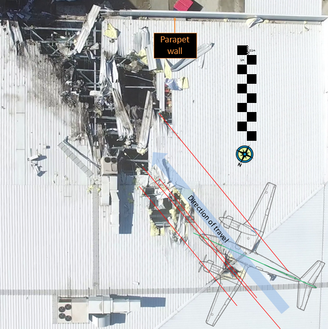 Figure 26: Outlet centre roof impact damage with scaled aircraft aligned with impact marks