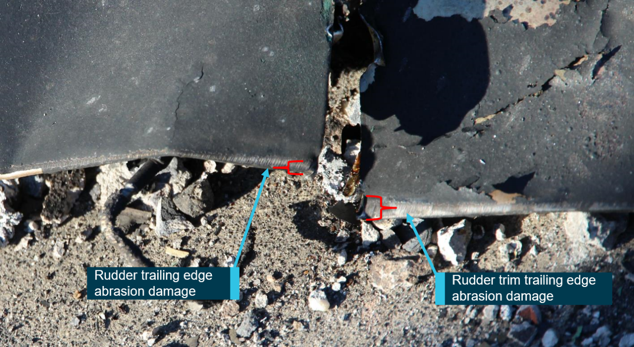 Figure 33: Detail A. Close-up of abrasion damage to rudder and upper surface of rudder trim trailing edge