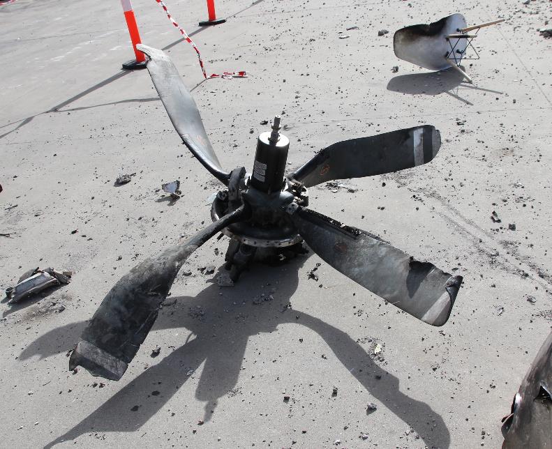 Figure 38: Front view of the right propeller showing bending, chordwise twisting, and leading edge gouging of the propeller blades