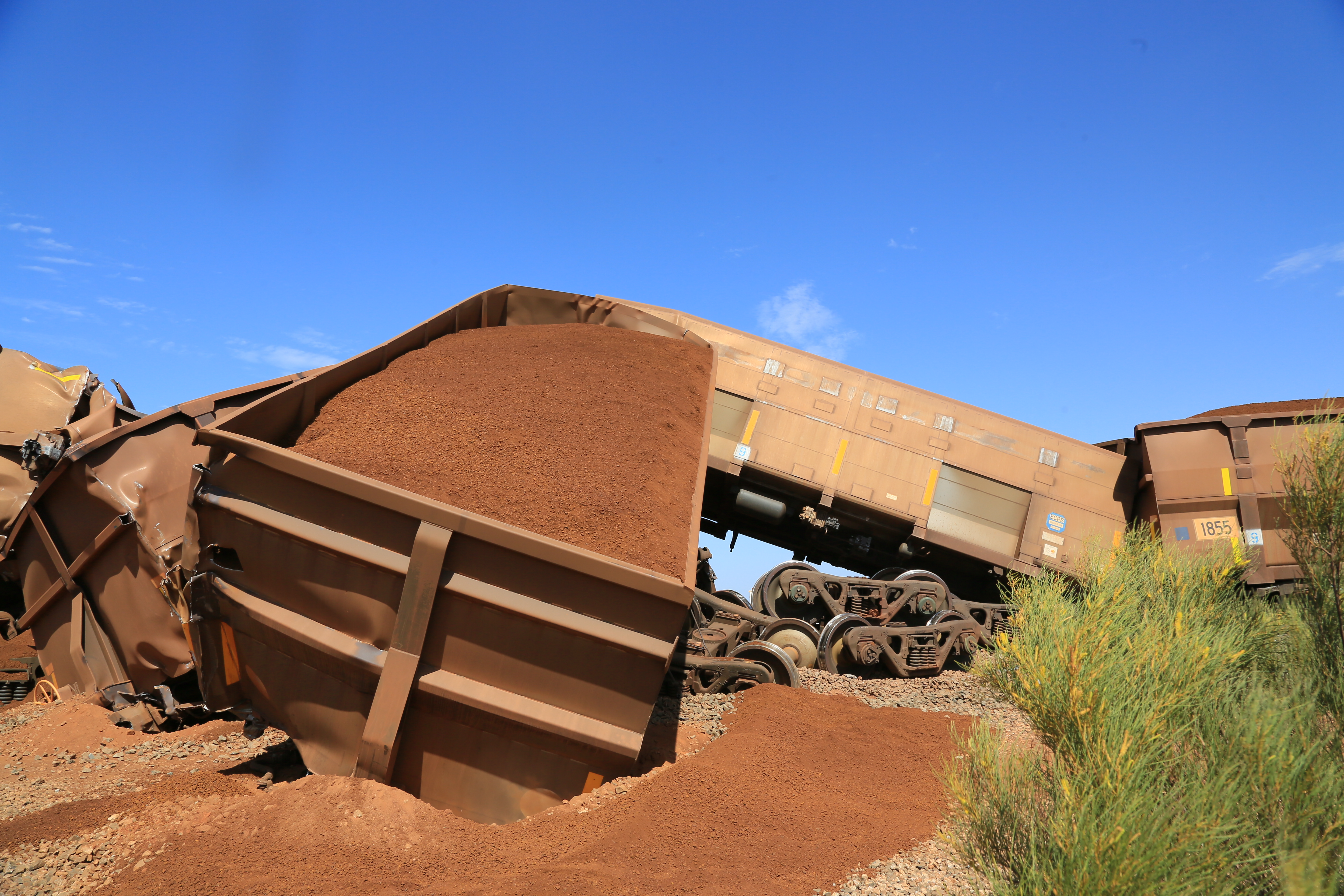 Figure 3: Derailed, loaded iron ore cars located in the rear portion of train M03544. Source: BHP Billiton