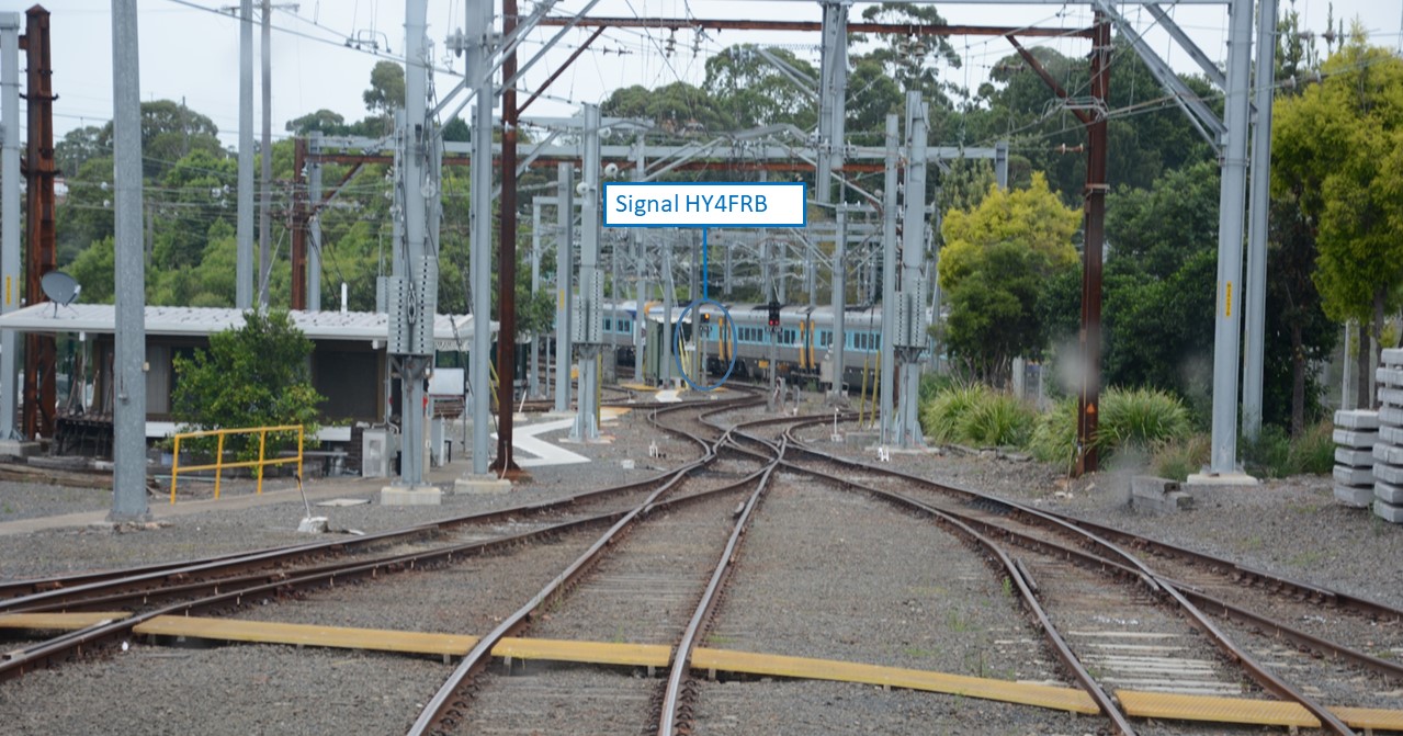 Figure 2: View from train driver’s cab to signal HY4FRB at HMC. Photograph of the tracks. Annotation highlights the location of Signal HY4FRB. Source: ATSB