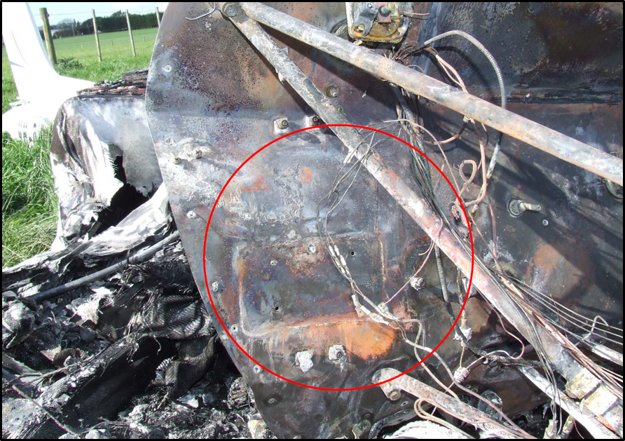 Figure 2: J 170-D area of fire origin. Source: Tasmanian Fire Service, Fire investigation Report Aircraft Fire TFS Incident Number 18033397- Photograph 23, annotated by the ATSB, indicating fire origin.