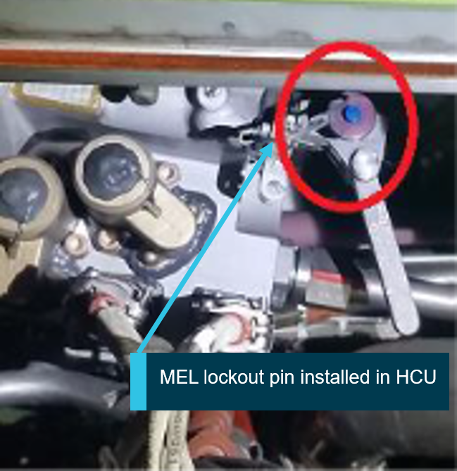 Figure 1: MEL lockout pin installed in thrust reverser hydraulic control unit (HCU). Source: Operator, annotated by the ATSB