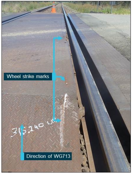 Figure 2: Wheel strike marks on Rosemount Road level crossing road plate. Source: ATSB
