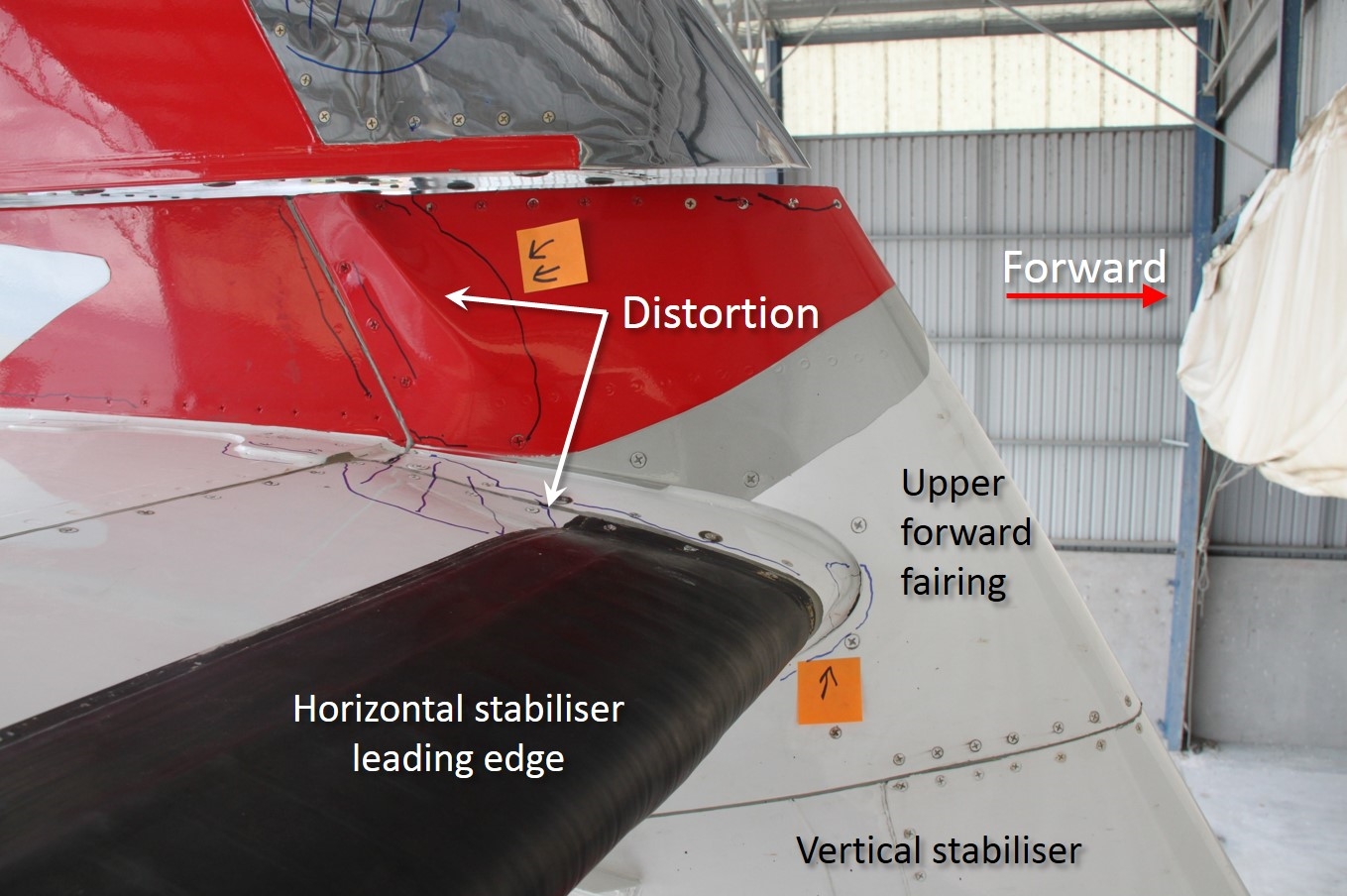 Figure 6: Distortion in the upper forward fairing right side horizontal stabiliser leading edge prior to removal of any fairings or access panels.