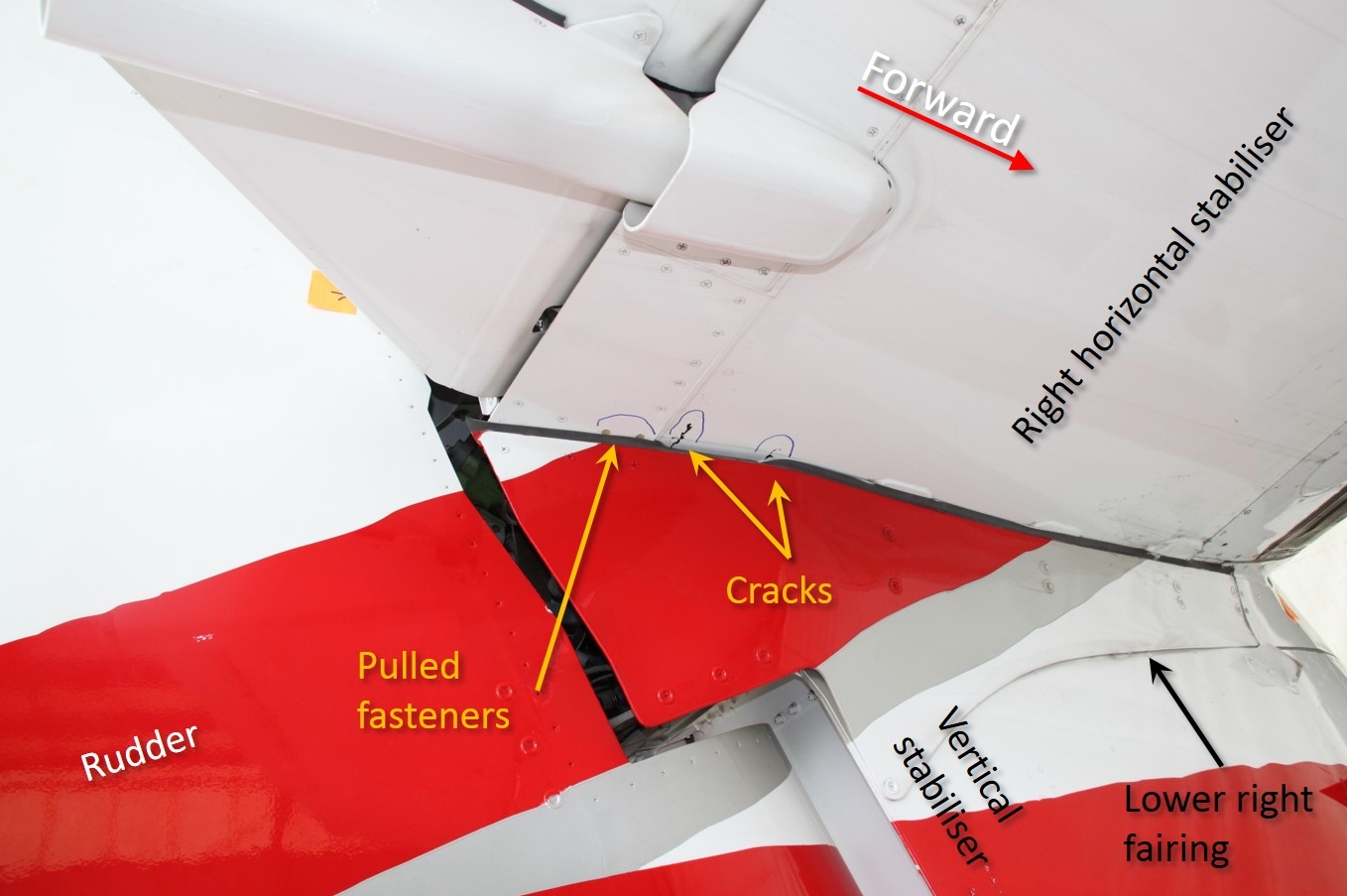 Figure 9: Damage visible on the lower right side of the horizontal stabiliser included fasteners pulled through the lower skin and cracks in the lower skin panel.