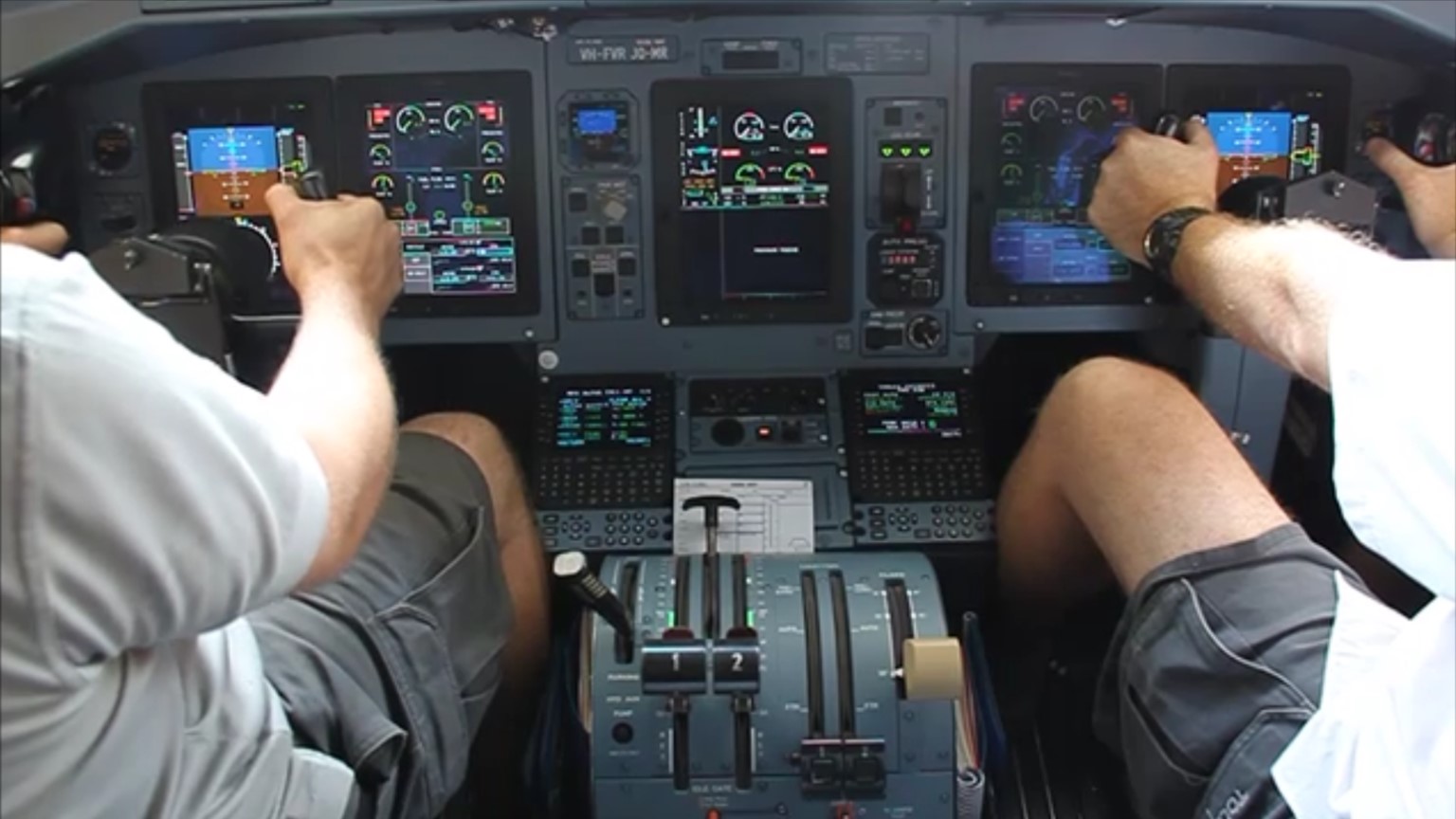 Figure 47: Still image from video of on-ground pitch disconnect testing carried out on VH‑FVR following the occurrence. The right control column was held fully forward while the left control was pulled back. The image is just before the pitch uncoupling mechanism activated. Note the difference between the left and right control column positions. The left control column is about halfway through its full travel, while the right control column is at the forward limit.