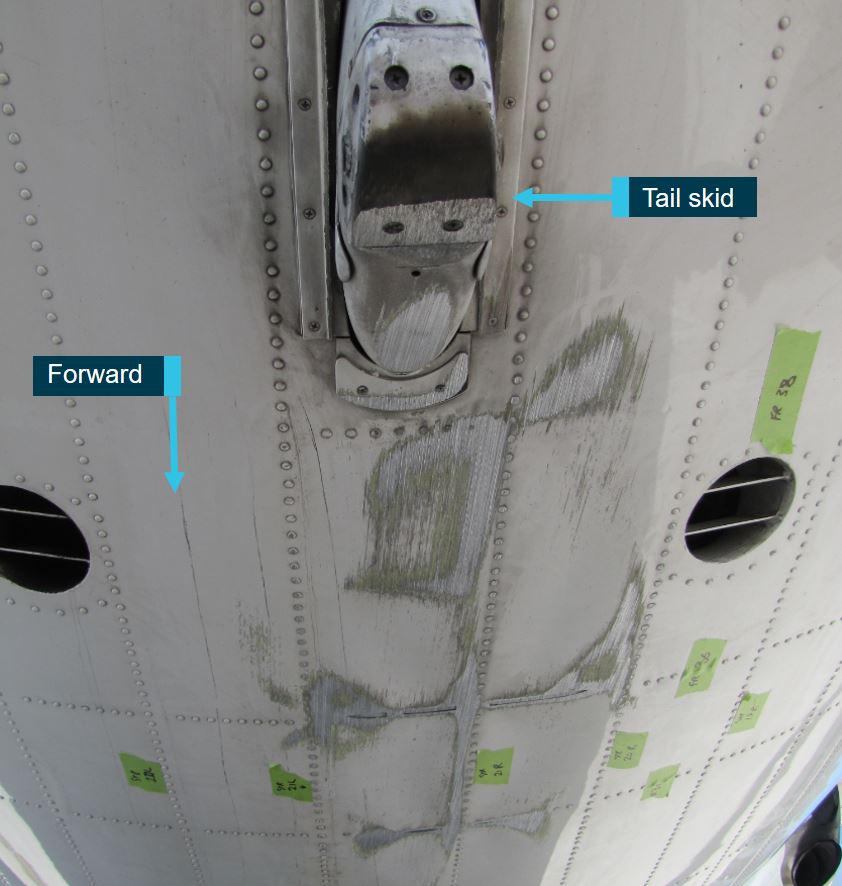 Figure 6: Damage to the tail skid and underside of the rear fuselage. Source: ATSB